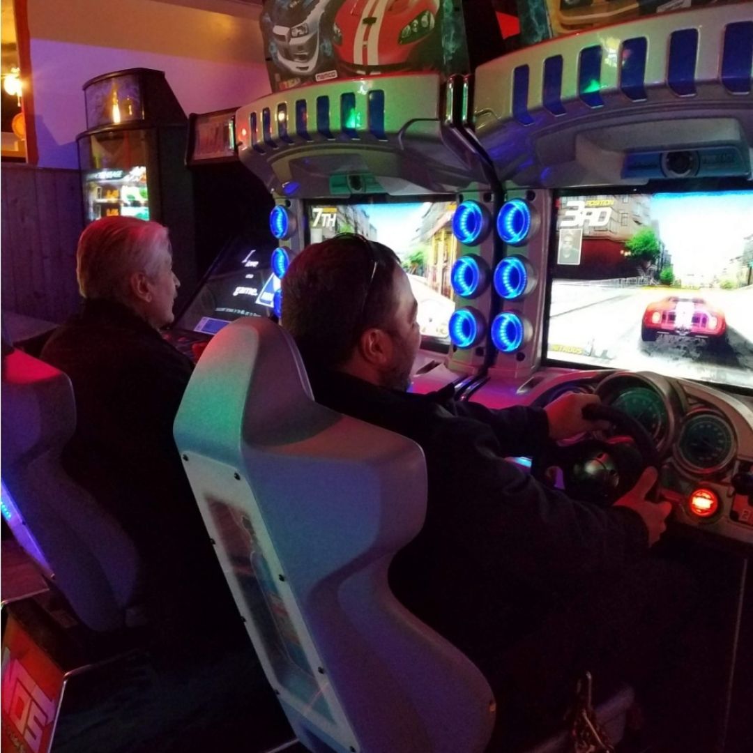 two people playing a racing game