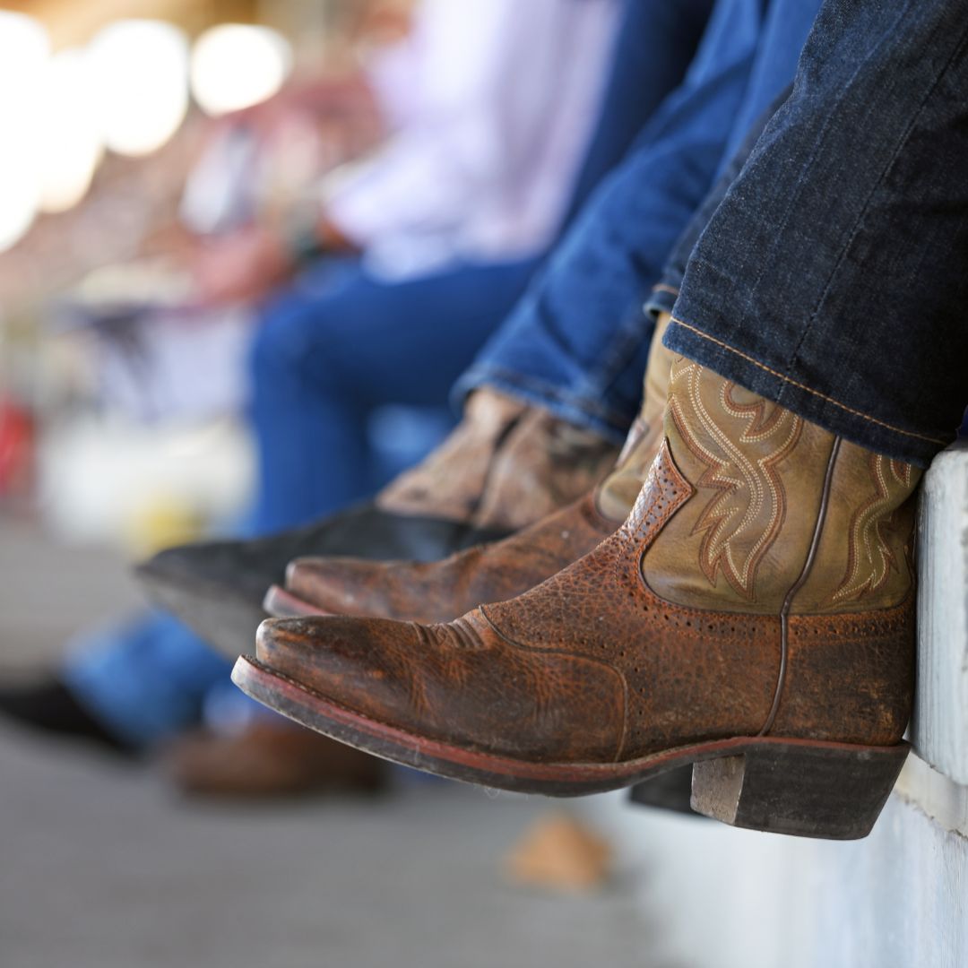 Kid's cowboy boots in a stand at a rodeo